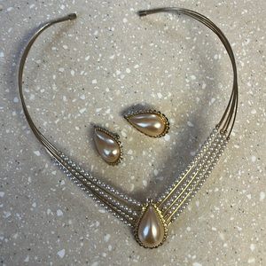 Gold tone necklace and earrings. Has sold on Poshmark. Duplicate